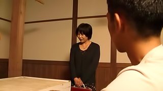Mature Japanese skank admires a guy with her blowjob talent