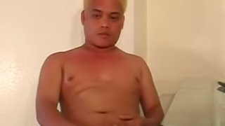 Blond gay cums in his wide pants and licking cum