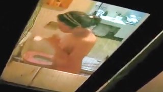 Voyeur sneakily tapes a girl in the shower
