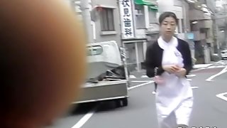 Adoring oriental nurse flashes her bum when some sharking lad lifts her uniform