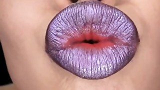 Beautiful Japanese babe with juicy lips poses on camera