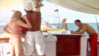 Two couples having great sex on a sailing ship in the middle of the ocean