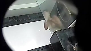 Full bodied female voyeured showering on the spy cam