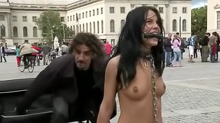 Kinky brunette walks naked in the street and gets fucked