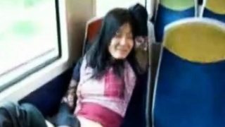 Asian milf masturbates pussy in the train