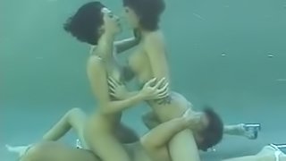 Underwater sex with two hot brunettes