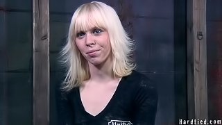 Blonde in bondage moaning when drilled using toy in BDSM