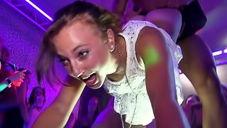 Clothed babes spread their legs and get banged in the club