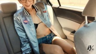 Frisky blonde teen makes a boring ride interesting by masturbating