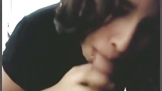 Hot dark haired girl with lip piercing gives her bf a blowjob