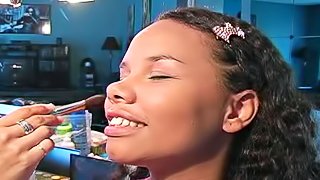 Doing makeup for cute black girl