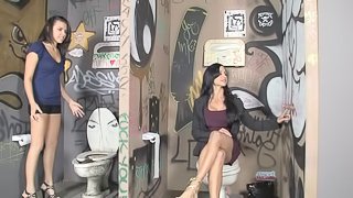 Two sluts take time to suck a hard cock in the toilet