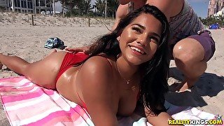 Juicy hot brunette Julz Gotti gets oiled at the beach and fucked at home