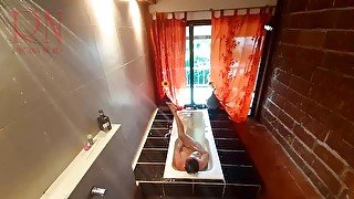 Peep. Voyeur. Housewife washes in the shower with soap, shaves her pussy in the bath.2