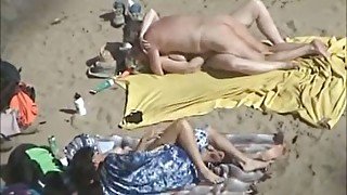 Two horny naked couples on the beach fucked on my voyeur video