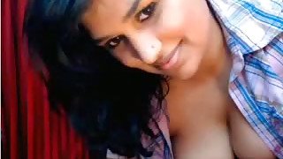 Kinky webcam busty brunette Nandini Again goes solo and tickles hairy cunt