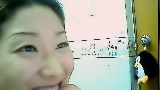 Homemade video of an asian slut playing with her hairy pussy