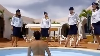 Kinky girls in stewardess uniform have wild sex by the pool