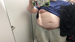 22-year-old obese masturbates in a fitting room of the store