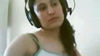Petite Turkish brunette on webcam listening music and masturbating