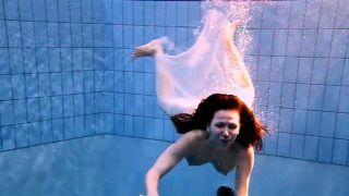 Andrea shows nice body underwater