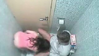 Amateur casual brunette was caught on spy cam while giving BJ in toilet