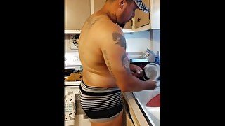 Beefy tattoo guy in muscle underwear cleaning the house part 2