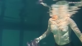 Saucy honey enjoys unveiling her hot body under the water