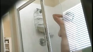Hidden shower cam gets fat mature chick showering