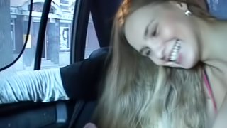 Naughty amateur girl gives a blowjob right in the taxi