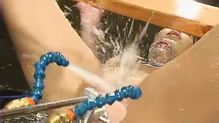 Stunning Kat gets toyed by a machine in water bondage video