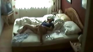 Caught milf masturbating on her bedroom. Hidden cam