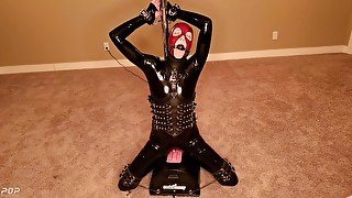 The Latex Motor Bunny - Sexy rubber dressed girl rides a Sybian then is made to cum in bondage on it