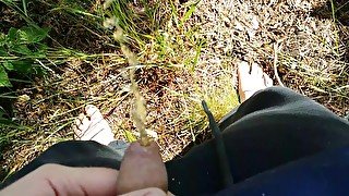 Small dick dude pissing outdoors