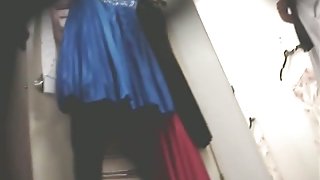 Voyeur dressing room video with female trying on new dress