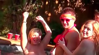 Hot blonde gets pussy pounded at a pool sex party