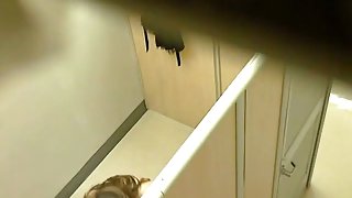 Spy cam in a changing room ceiling captures some tits
