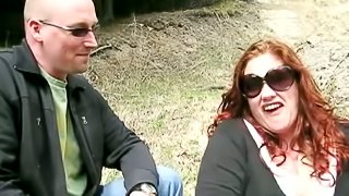 Fat redhead mom plays lesbian games with a slim blonde in a forest