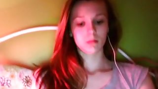 Cute girl feels horny and searches for cybersex online, so she can satisfy her hairy pussy by rubbing it.