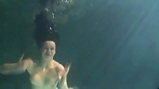 Shaved pussy brunette teen underwater
