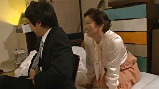 Horny Japanese mature Chizuru Iwasaki gets fucked by a coworker