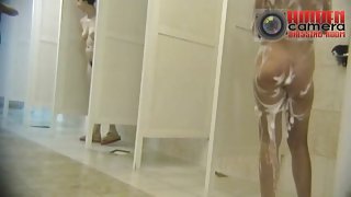 Big fanny soaped well in a voyeur bathroom cam video