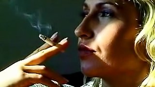 Smoking blonde in a sexy temptress