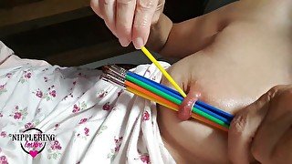 nippleringlover inserting brushes in stretched nipple piercings - pierced tits huge nipples - part 2