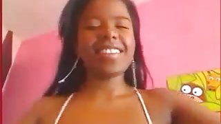 Black girl teases with huge boobs in white top
