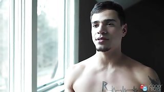 Interview with a shirtless gay pornstar