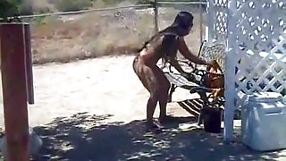 Mexican girl doing chores totally nude outside