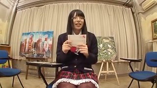 Japanese hussy wearing glasses and a miniskirt plays with her snatch