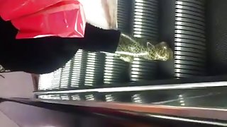 Big booty Mexican on escalator