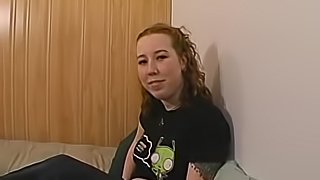 Hot red head talks about her sex life for a while and soon gets naked.